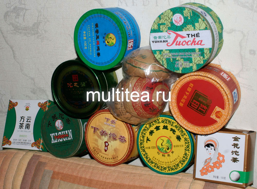 много круглых коробочек с шен пуэр Xiaguan Tuocha Tea (Group) Co., Ltd купленных на aliexpress