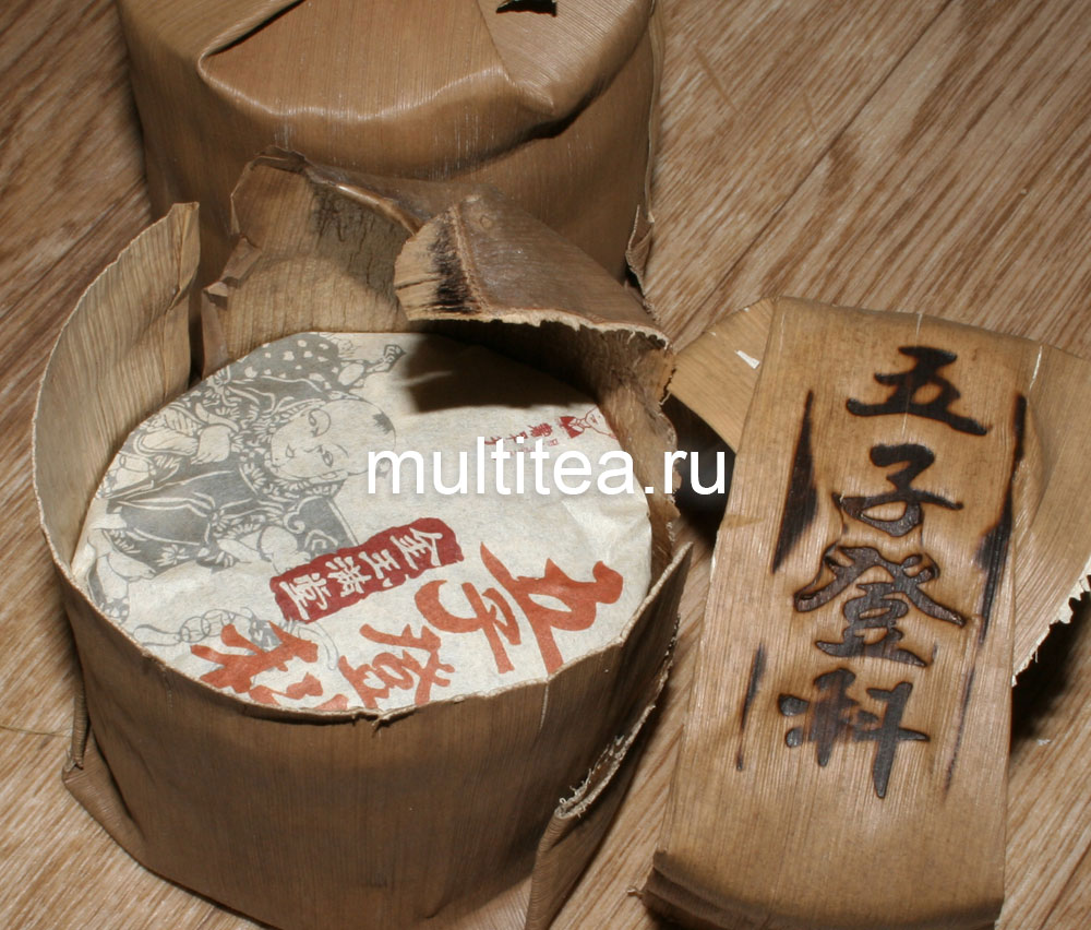 Раскрытая упаковка шен пуэра DrPu’Er