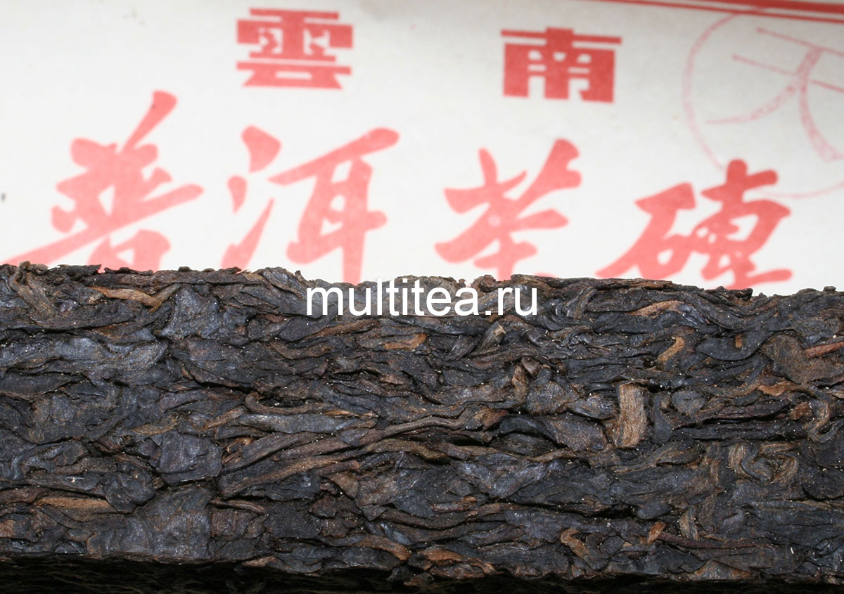 крупный план содержимого кирпича шен пуэра Yunnan PingXiWangFu Shengtai Tea Co.,Ltd