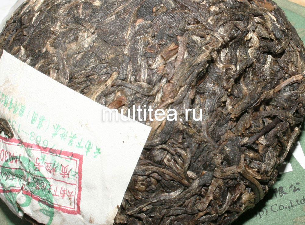 шен пуэр Xiaguan зеленая круглая коробка. под листьями туочи бумажка с печатью подлинности.